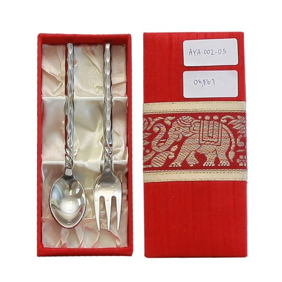 Coffee spoon and 2 sweet utensils in silk box
