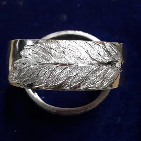 Silver bracelets, leaf pattern engraved